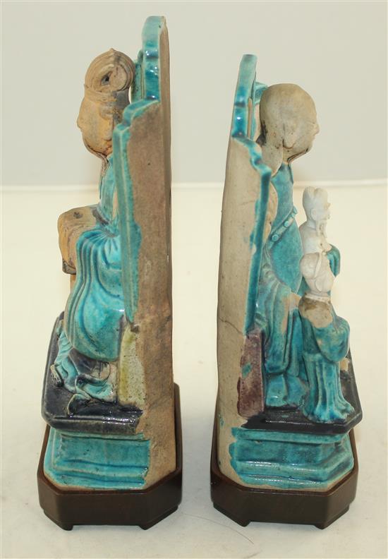 Two Chinese Fahua-decorated figures, Ming dynasty, 19.5cm, wood stands